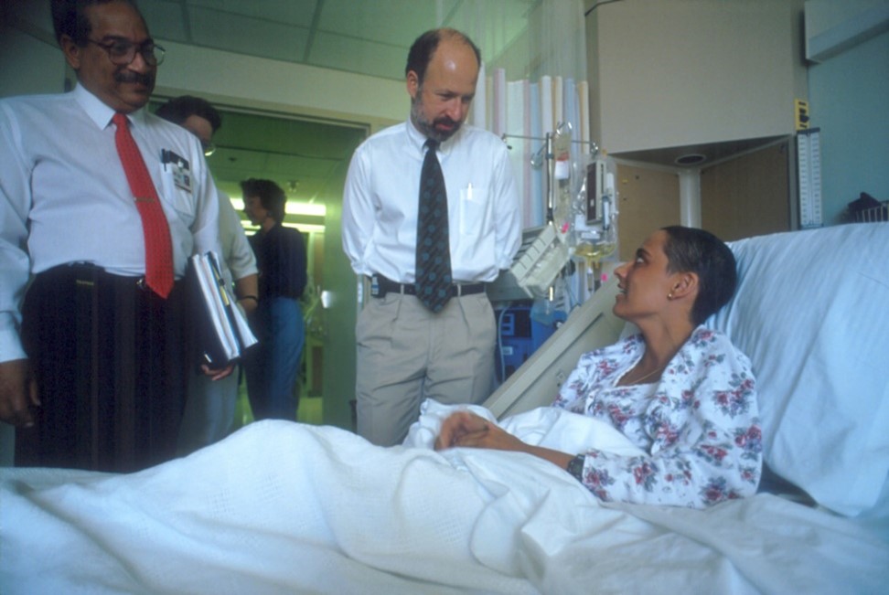 Dr Appelbaum talks with a transplant patient